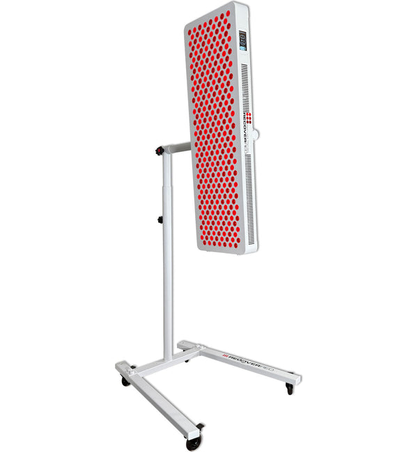 Red light therapy lights on a vertical stand.